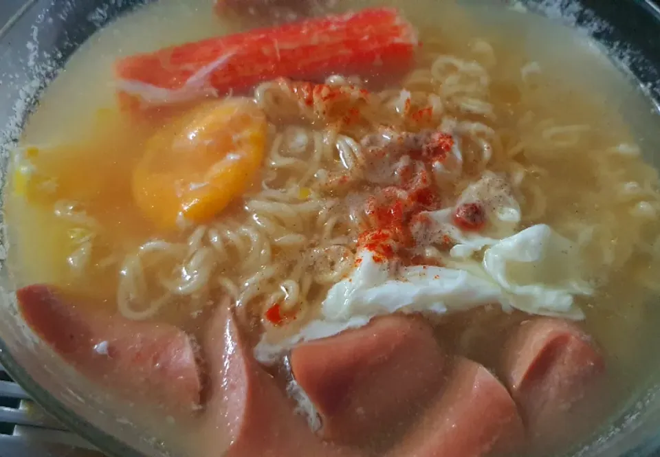 Snapdishの料理写真:Chicken noodles add chilli powder sesame oil white pepper chicken sausage crab stick egg🥰|🌷lynnlicious🌷さん