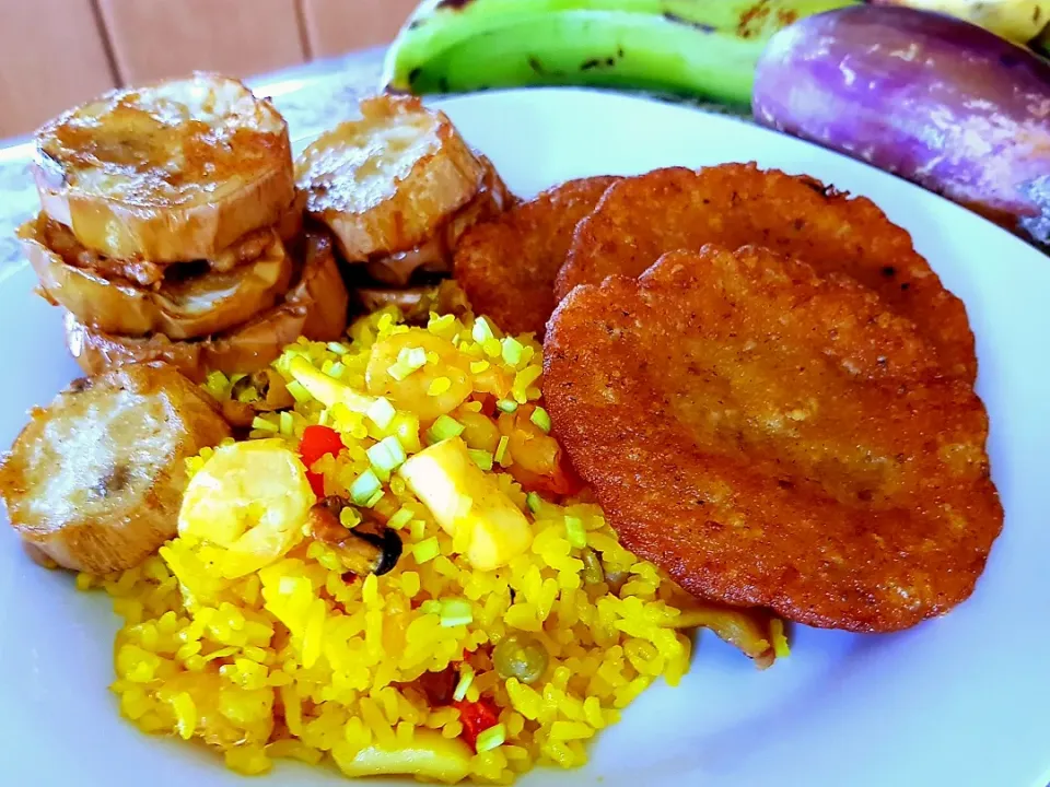 Snapdishの料理写真:Seafood Rice, Fried Eggplant and "Bacalaitos"|Miguel Ángelさん