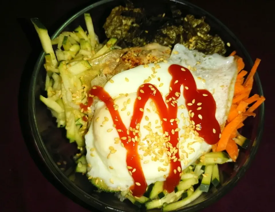 bibimbap 

Bibimbap, is a popular dish of Korean cuisine, literally means "mixed rice" or "mixed food".  It consists of a bowl of rice with vegetables and meat |Mary👩🏽‍🍳さん