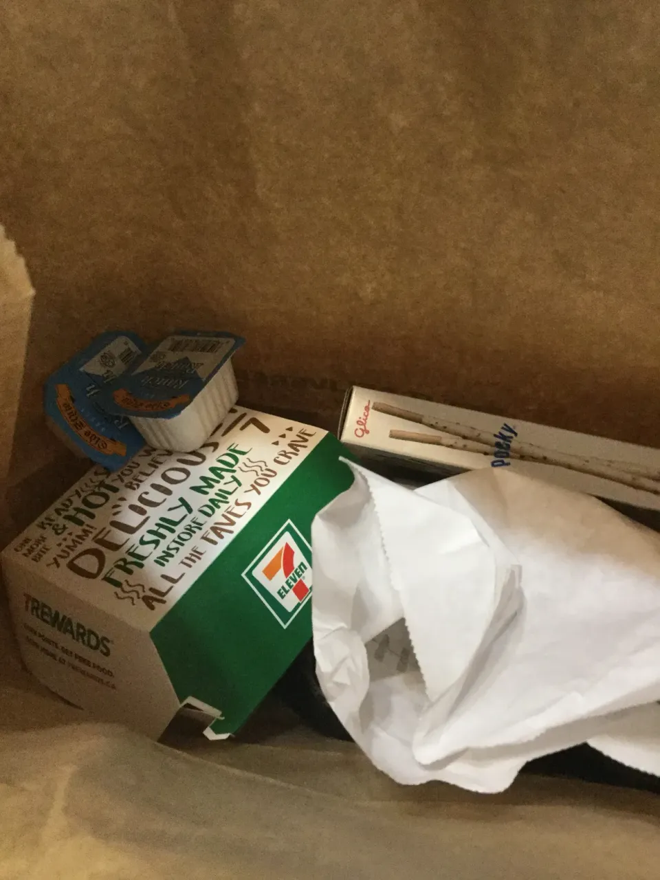 Snapdishの料理写真:They’re got new chicken sandwich spicy combo with potato wedges and pocky at 7-eleven|ninja kittyさん