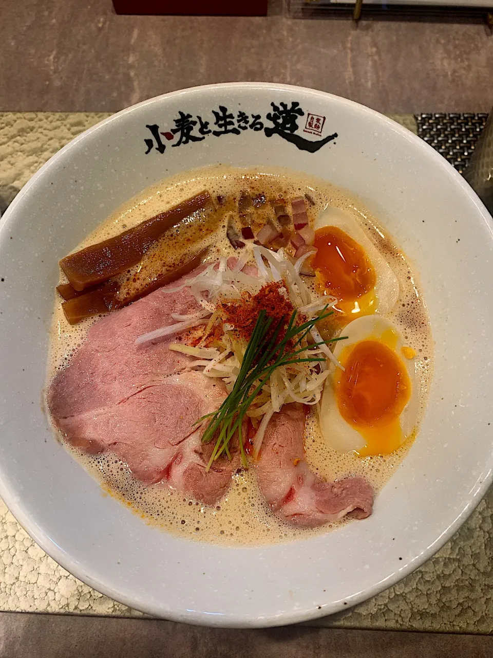 Snapdishの料理写真:長堀橋 小麦と生きる道 濃厚鶏白湯そば旨み麻辣テイスト ¥950 2021.06.18|papicoさん