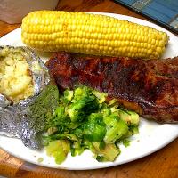 Grilled NY Strip, Baked Potato, Corn & Brussel Sprouts