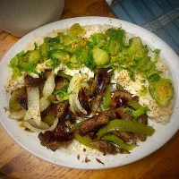 Snapdishの料理写真:Grilled NY Angus Strip Steak, Bell Peppers & Onions with White Rice & Brussel Sprouts with soy sauce, garlic, black pepper and seasoning.|Michaels Culinary Adventuresさん