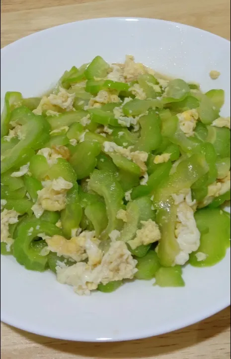 Snapdishの料理写真:Stir Fried Bitter gourd with eggs 😃|MeLicious Foodさん