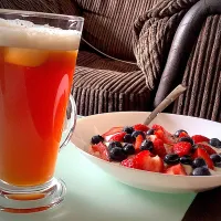 Berries with yogurt and honey and iced tea on the side|FoodAddict123さん