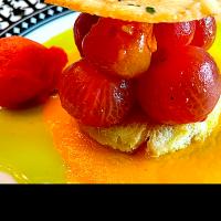 Baby Tomatoes with Basil Oil and a Yellow Tomato Coulis and a Garlic Tuiles