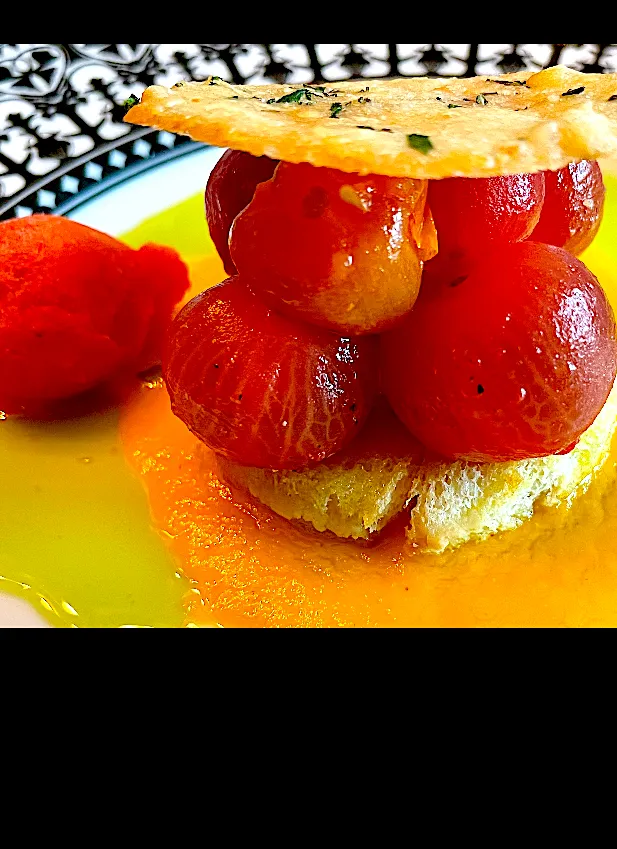 Baby Tomatoes with Basil Oil and a Yellow Tomato Coulis and a Garlic Tuiles|Christine pavelkaさん