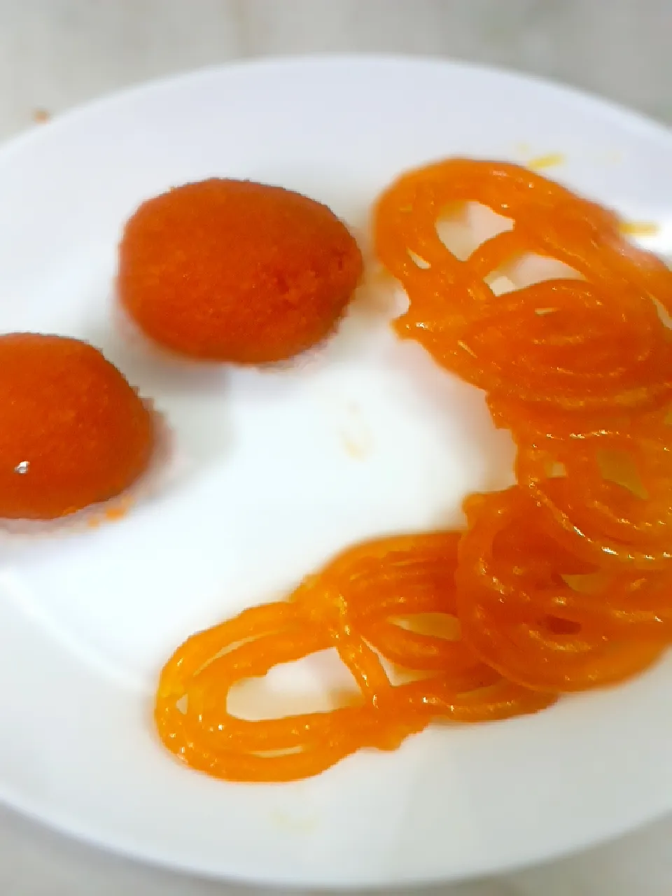 Shreya's feast's dish laado and jalebi|Shreya's feastさん