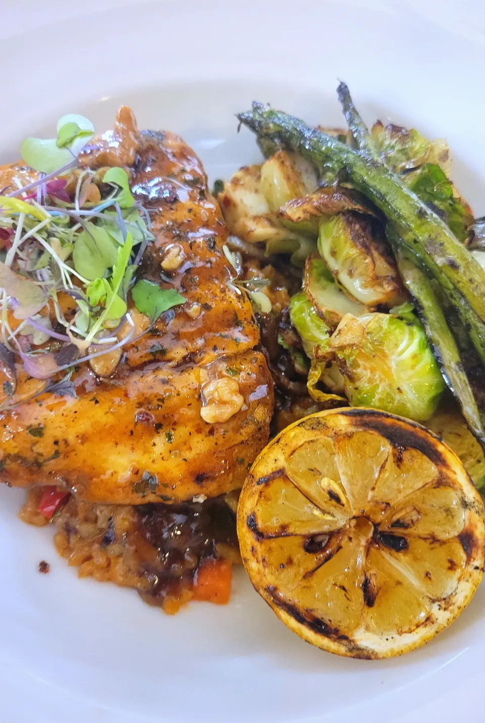 walnut maple glazed Atlantic Salmon served over Spanish rice w/roasted sprouts|Charlie Hustleさん