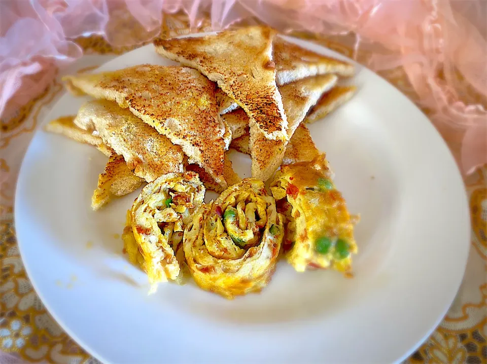 Snapdishの料理写真:Toasted bread with egg rolls|Cecilさん