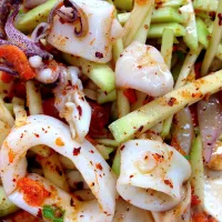 Snapdishの料理写真:Spicy mango salad with squid # ยำมะม่วงปลาหมึกรสแซบจัดจ้าน|nangさん