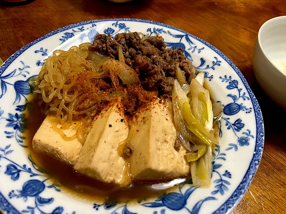 Snapdishの料理写真:肉豆腐に七味をどばーっ|さんだーさん