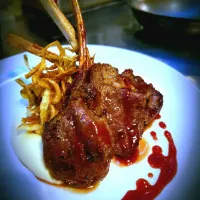 pan seared lamb with velvety truffle mash,cranberry gel and onions string nest.|Rich mさん