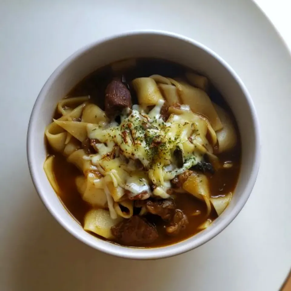 炙りチーズの牛すじカレースープだんご麺|mi_neneco♪さん