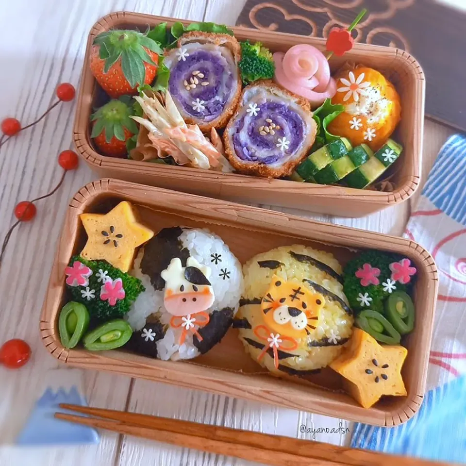 ゆく年くる年弁当
まんまるおにぎり🐮&🐯|ayano.adshさん