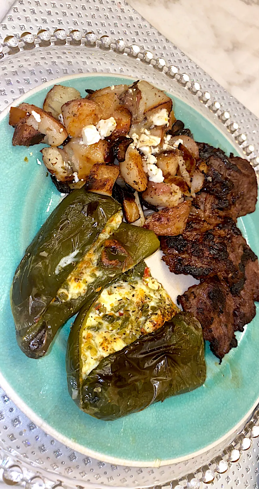 Mesquite charbroiled skirt steak with Greek style potatoes and three cheese Stuffed Poblano peppers|Tawanjaさん