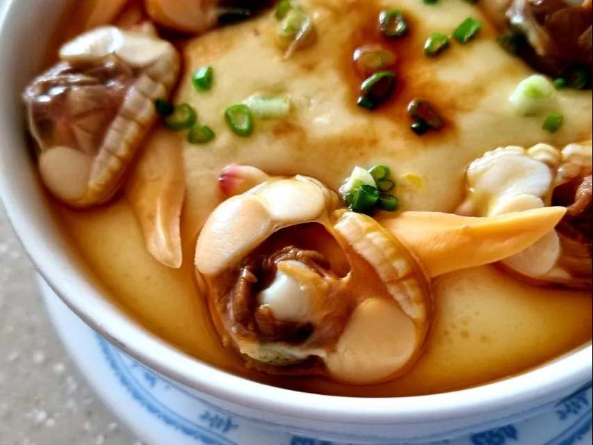 Snapdishの料理写真:steamed egg custard with yellow clams|steven z.y.さん