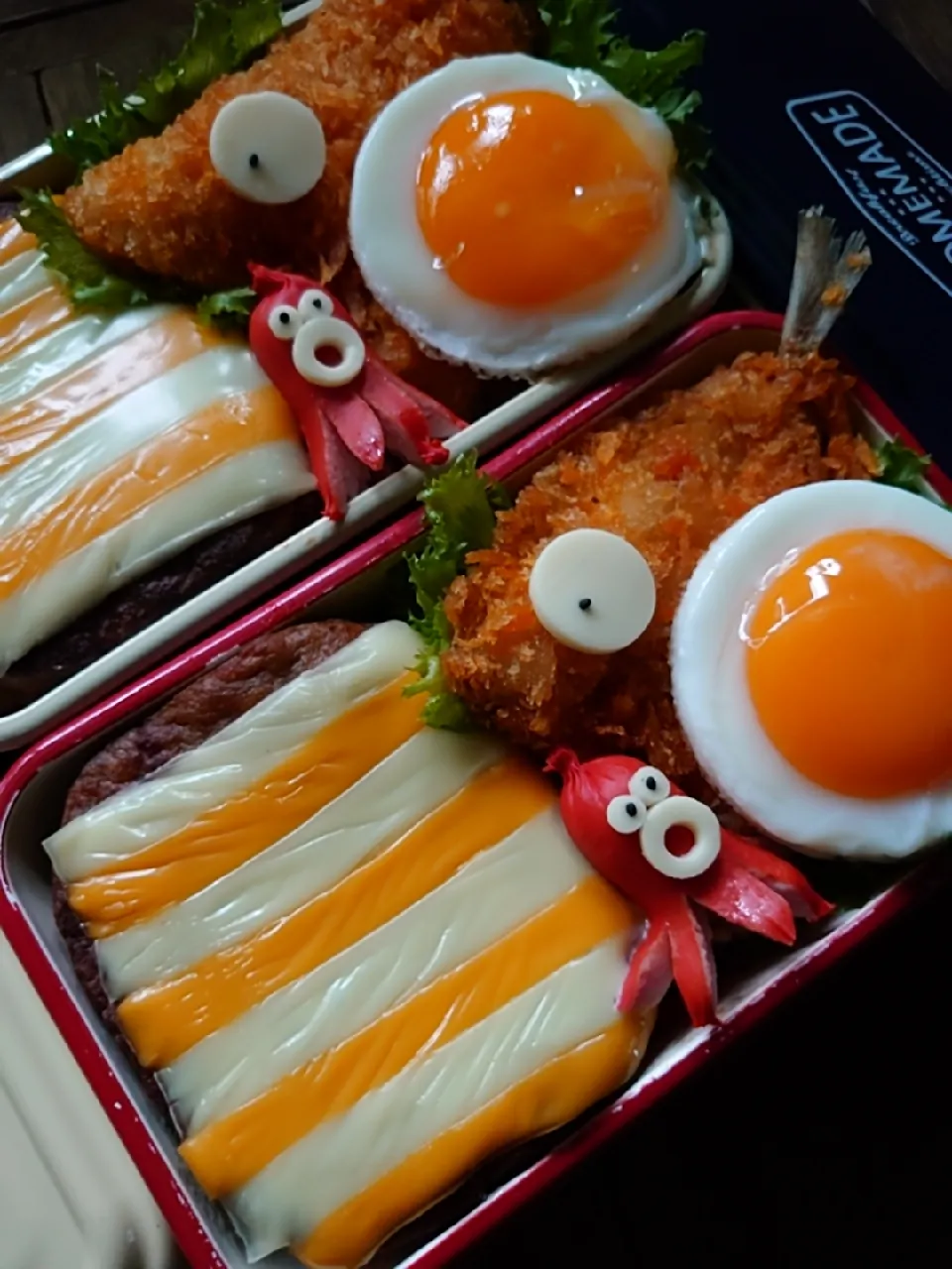 Snapdishの料理写真:漢の…自分用👔と妻用🎽アジフライとしましまチーズハンバーグ弁当🍱|ᵏᵒᵘさん