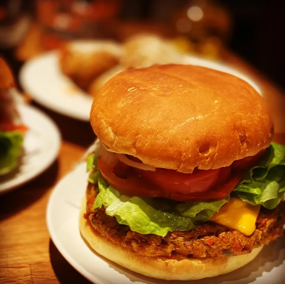 Snapdishの料理写真:Dinner! Dinner ! 
Something Vegetarian 
Healthy Bean & Tofu Herb & Spice Cheeseburgers 🍔 
With Parmesan Veg Meatballs on the side with a tomato salad with sesa|Emanuel Hayashiさん