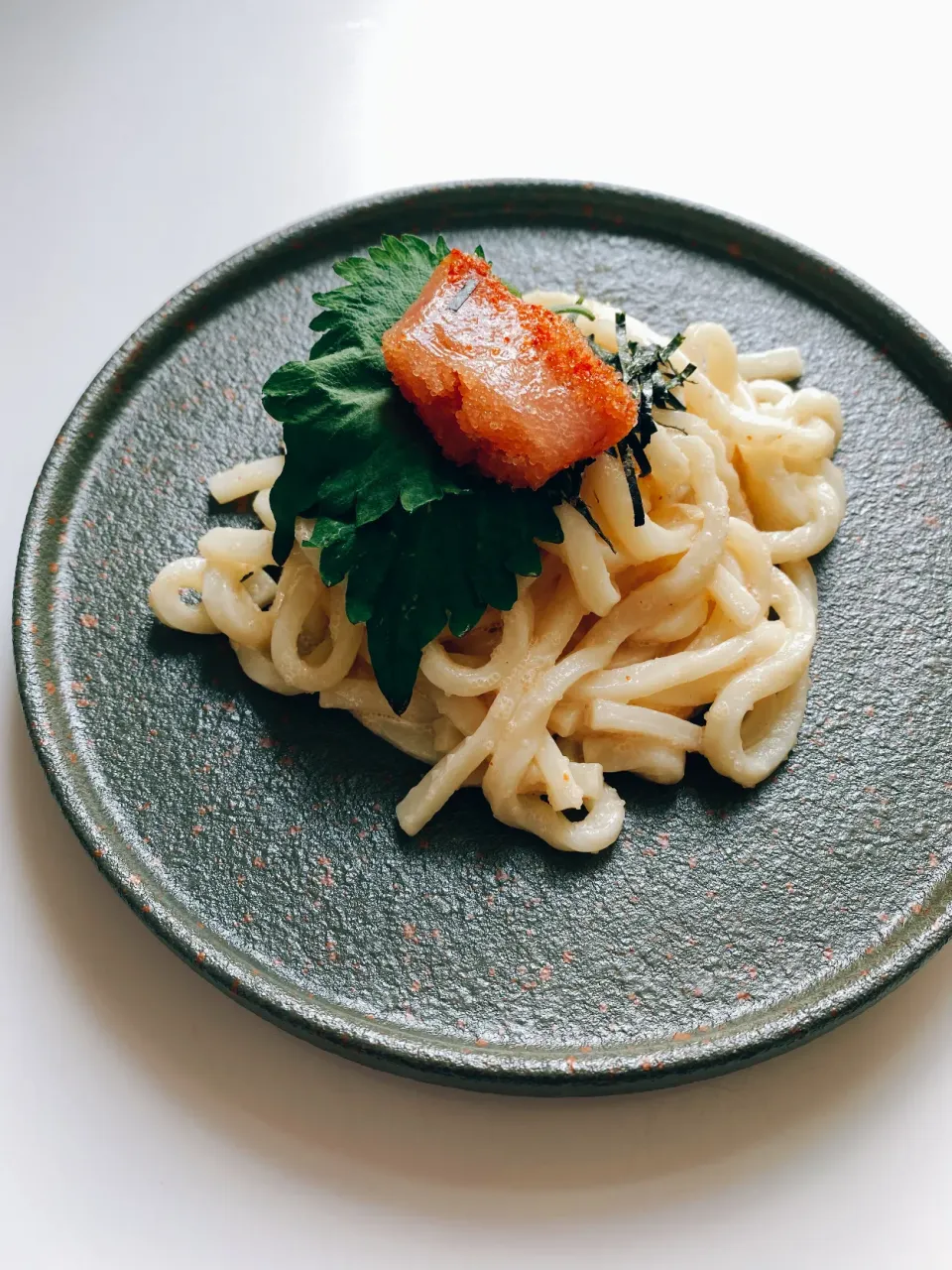 Snapdishの料理写真:明太子バターうどん！青じその香りと最高！|Muiさん