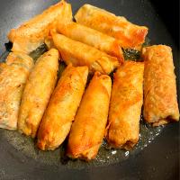 Vegetable eggrolls - cabbage, carrots, sweet potatoes, yams, greenbeans , beans sprouts, onions, garlic, saute, cook halfway, cool it down , then wrap in eggrol