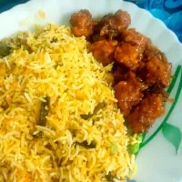 Snapdishの料理写真:Biriyani with Manchurian|priyadarshan tripathyさん