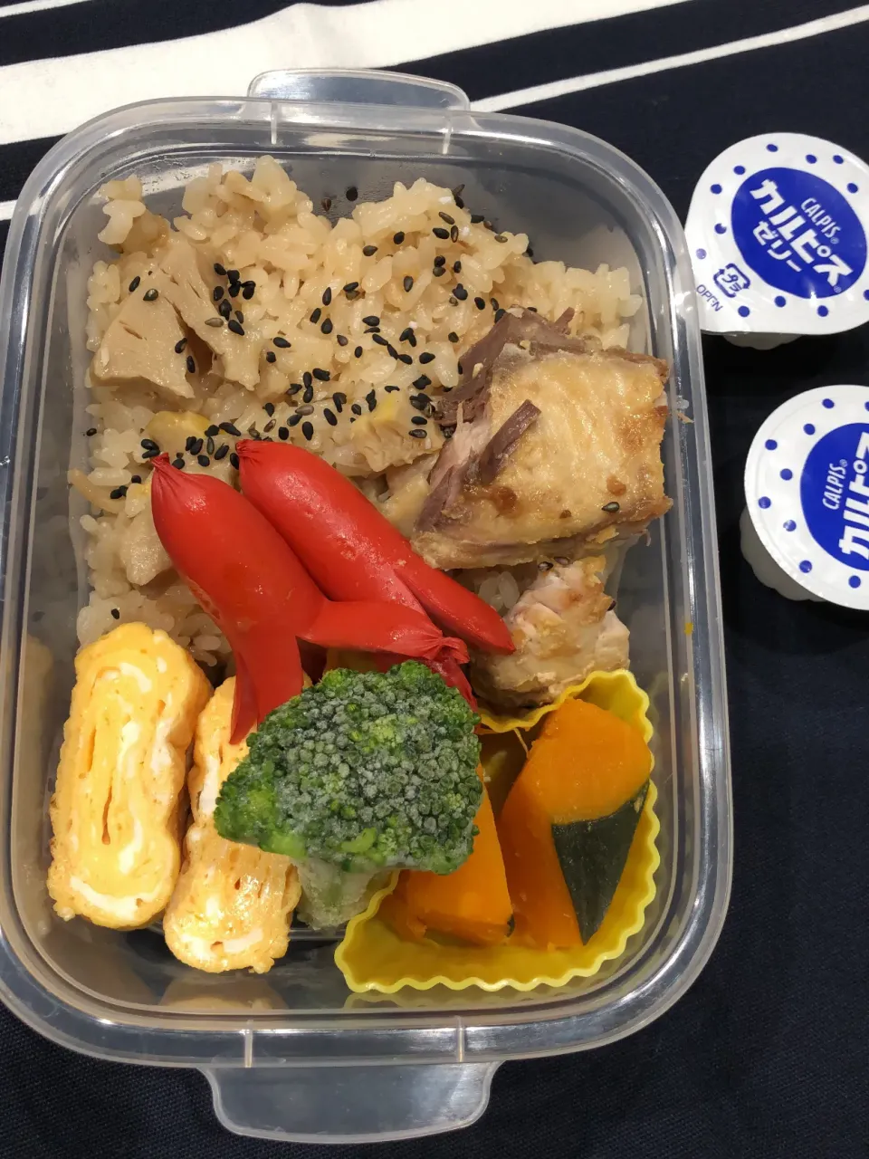 Snapdishの料理写真:たけのこご飯、たまご焼き、タコさんウインナー、カボチャの煮物、ぶりの西京焼き、ブロッコリー|きらきらさん