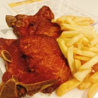 chuletas de cerdo fritas en papas toscanas|Vladimir Monsantoさん