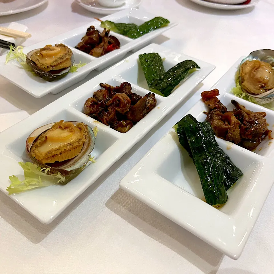 Chilled marinated abalone, braised sea whelk with XO sauce, garlic cucumber|skyblueさん