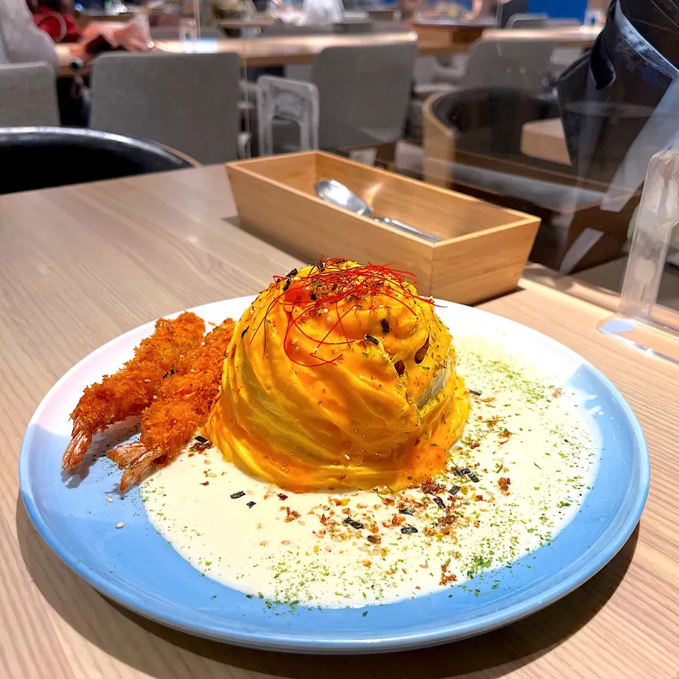 Assorted seafoods, prawn cutlets, cream sauce, signature tomatoes omelettes rice|skyblueさん