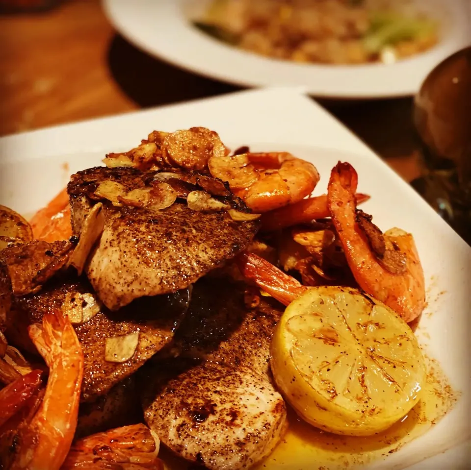 Snapdishの料理写真:Dinner ! Dinner ! 
Peppered Sword Fish Steak pan seared in Butter & Garlic with Fried Lemon 
With Garlic Butter Tiger Prawns 
Stir fried race with cabbage Soy S|Emanuel Hayashiさん