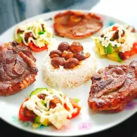 Lamb chops with white rice, chestnut mushrooms, tomatoes, cucumber, lettuce, avocado, greek cheese and mayonnaise.|Aldin Alicさん