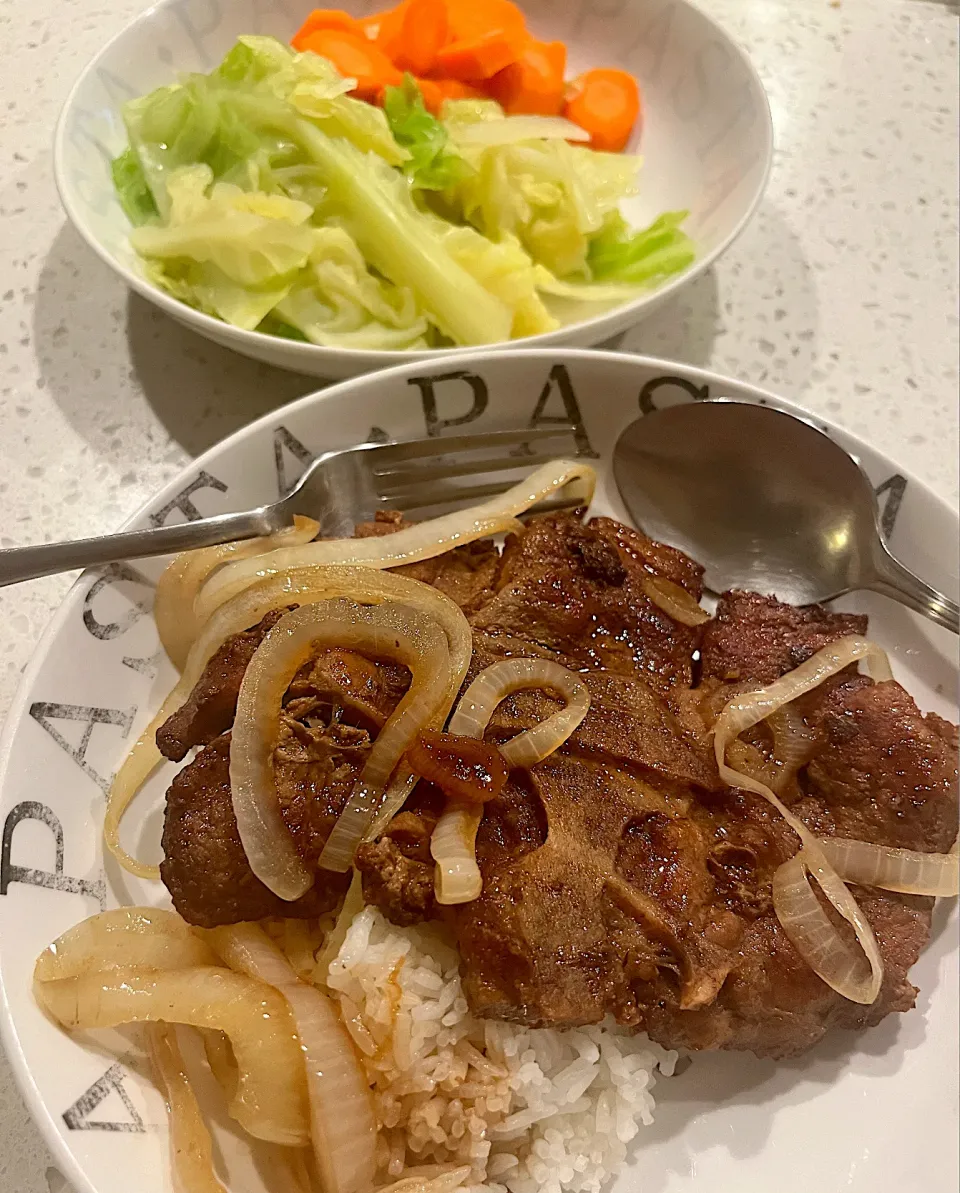 Snapdishの料理写真:Pork steak & grilled onions with steamed cabbage and carrots on the side|🌺IAnneさん