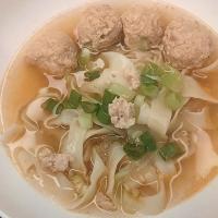 Homemade noodle soup with chicken meatballs
