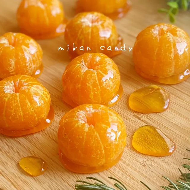 Snapdishの料理・レシピ写真:こずりんさんの料理 丸ごとみかん飴🍊｜旬を食べよう！みかん活用大辞典