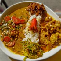 牛ホルモンカレー＋金時人参と水菜のミックスダルカレーのあいがけカレーwithタコさんウインナー🐙🍛