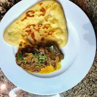 Lamb curry and roti.| reshoketswe legoabeさん