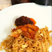 Turmeric Chicken Fried Rice served with mixed fruits pickle|feeqsyaneeさん