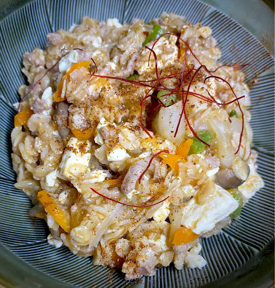 Snapdishの料理写真:麻婆豆腐風中華粥|すくらんぶるえっぐさん