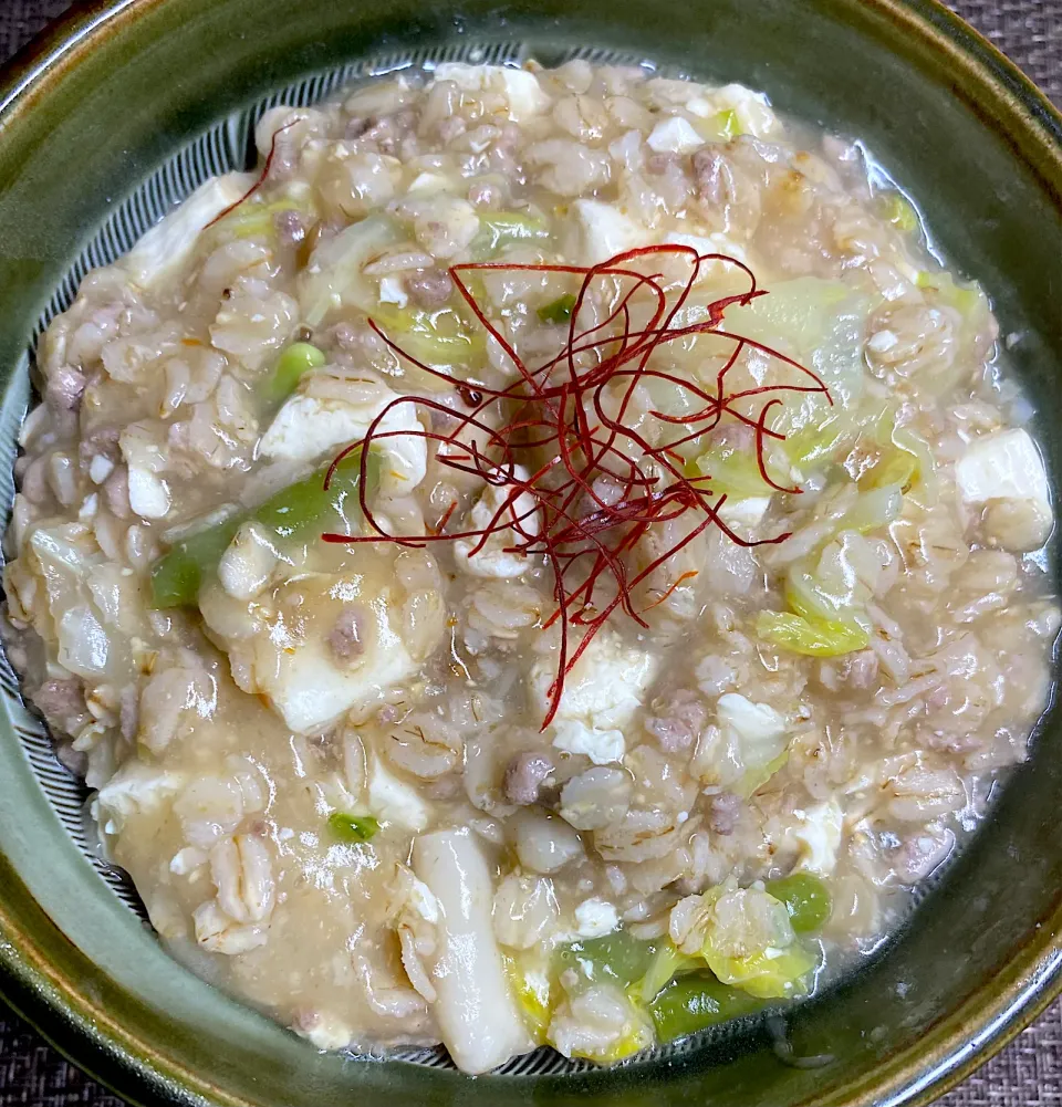 Snapdishの料理写真:麻婆豆腐風粥|すくらんぶるえっぐさん