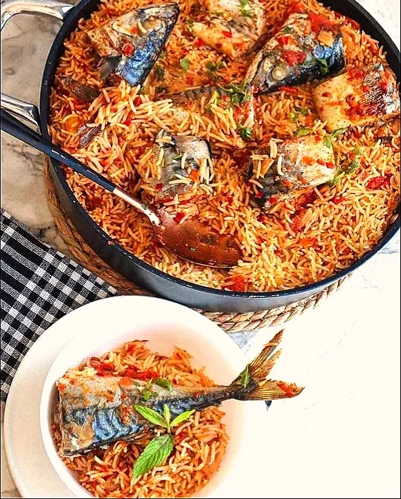 Snapdishの料理写真:Nigerian "Local jollof rice" and fish|MOさん