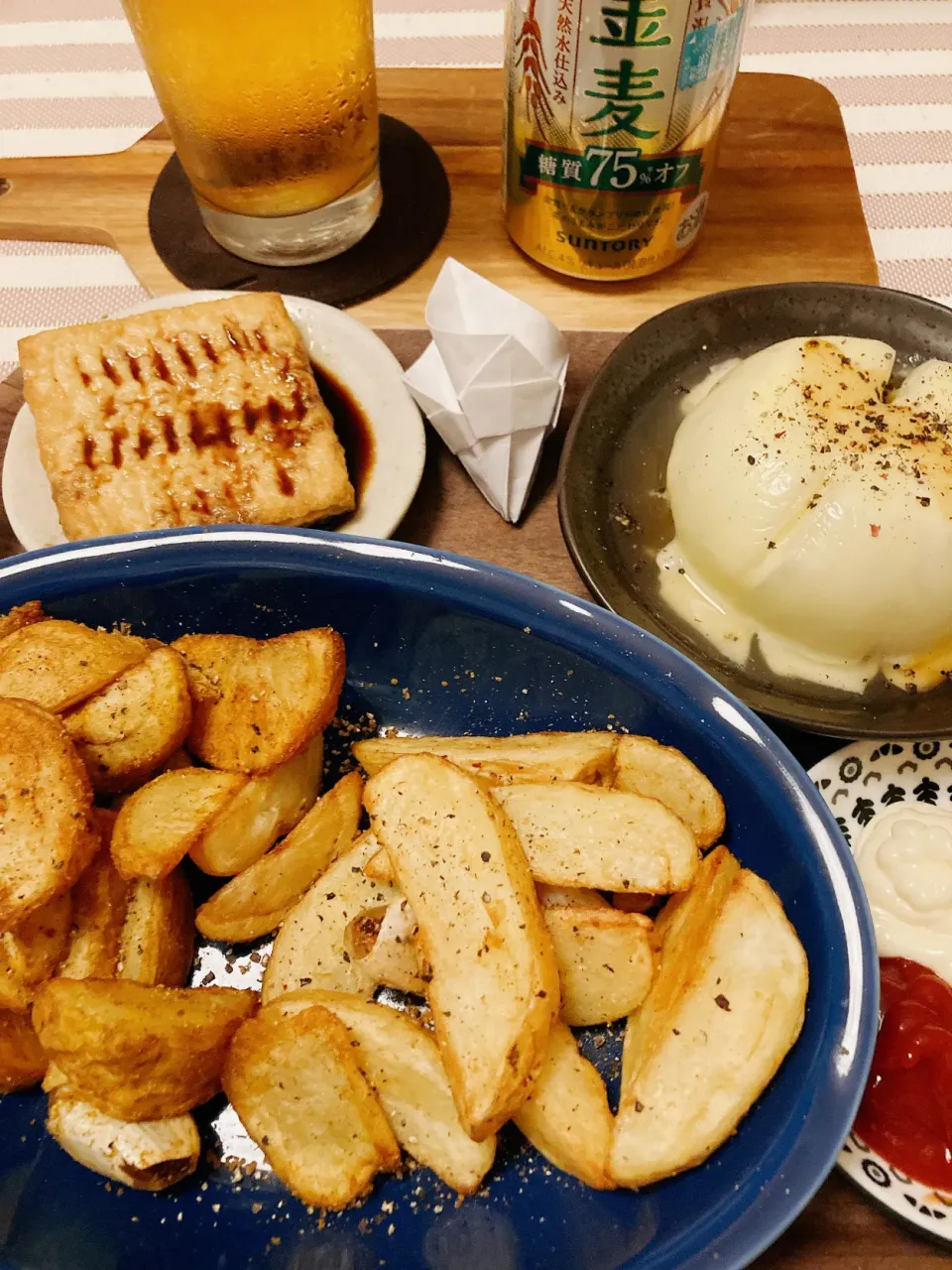 Snapdishの料理写真:新じゃがポテト🍟新玉ねぎonTheメルトロ🧀厚揚げで🍻|gunlove❤さん