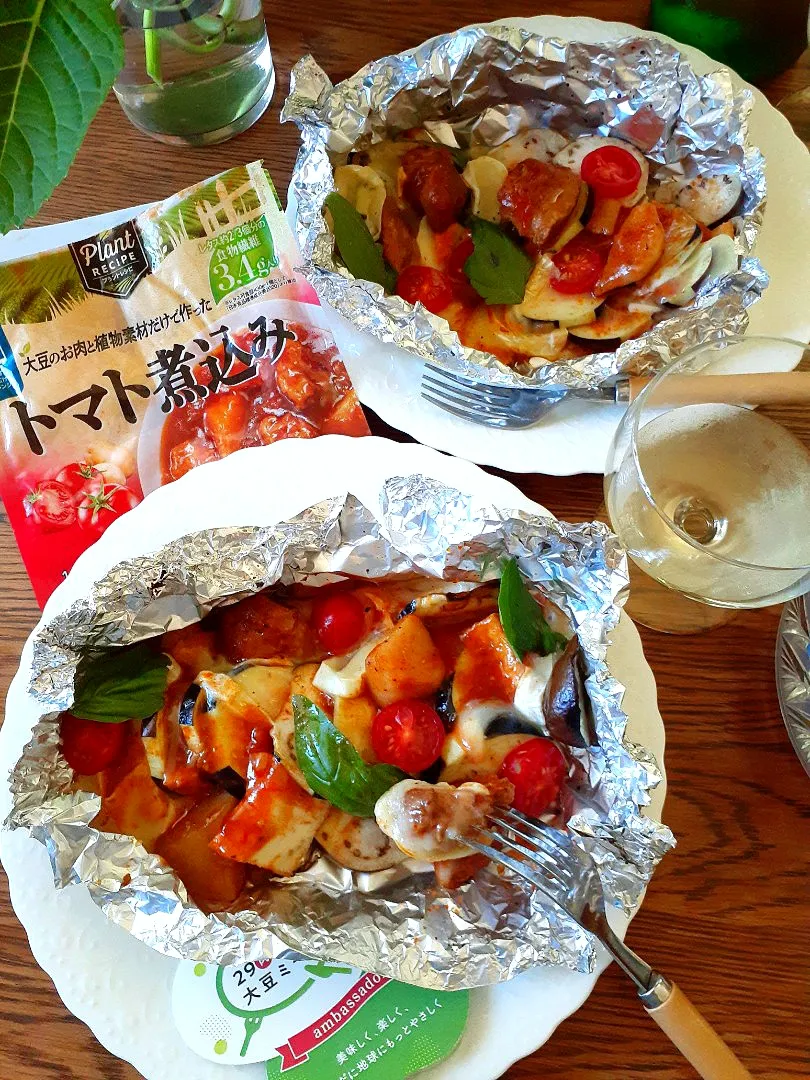 丸大食品さんのトマト煮込みで～🤗
茄子と厚揚げのホイル焼き🍅|fumfumさん