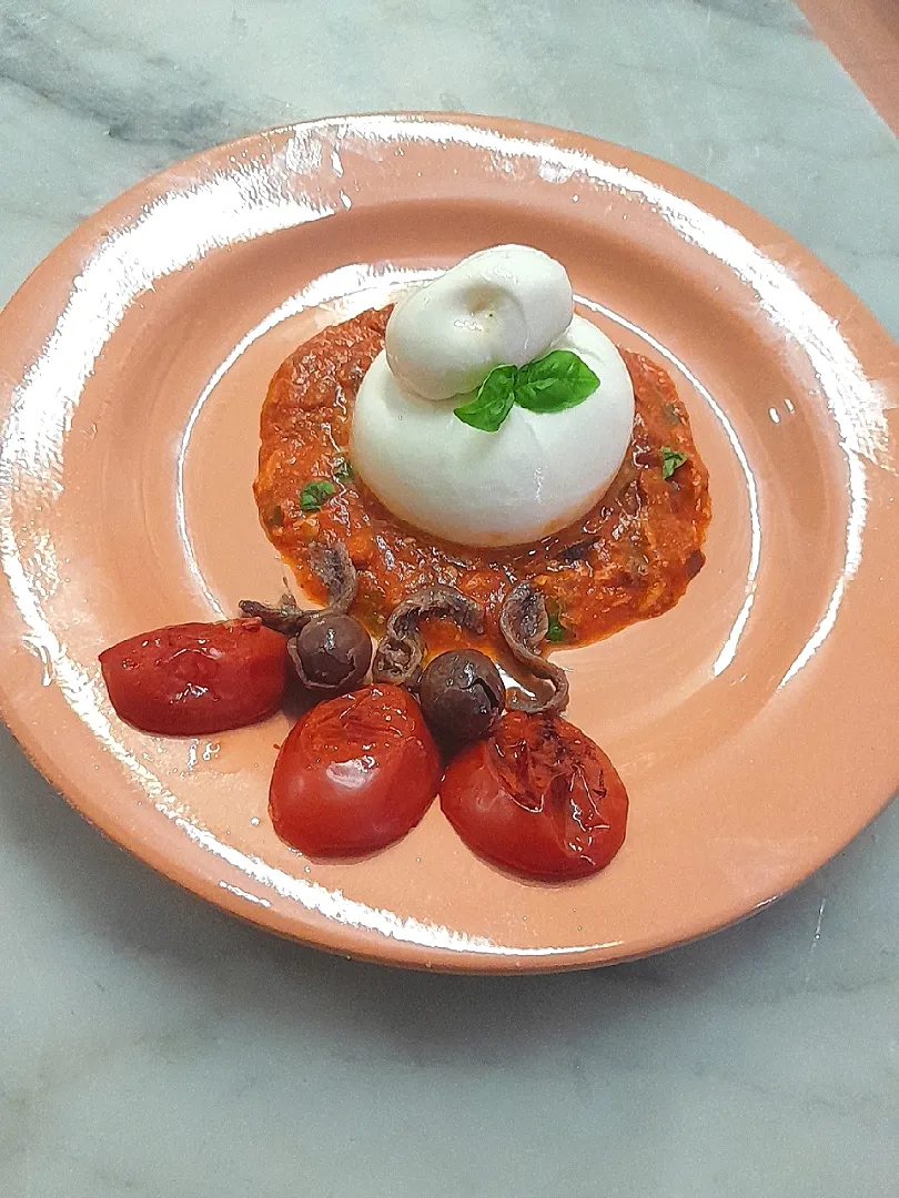 burrata with roasted fresh pomodorino ,olive and basilico sauce.|Giovannina Napolitanoさん