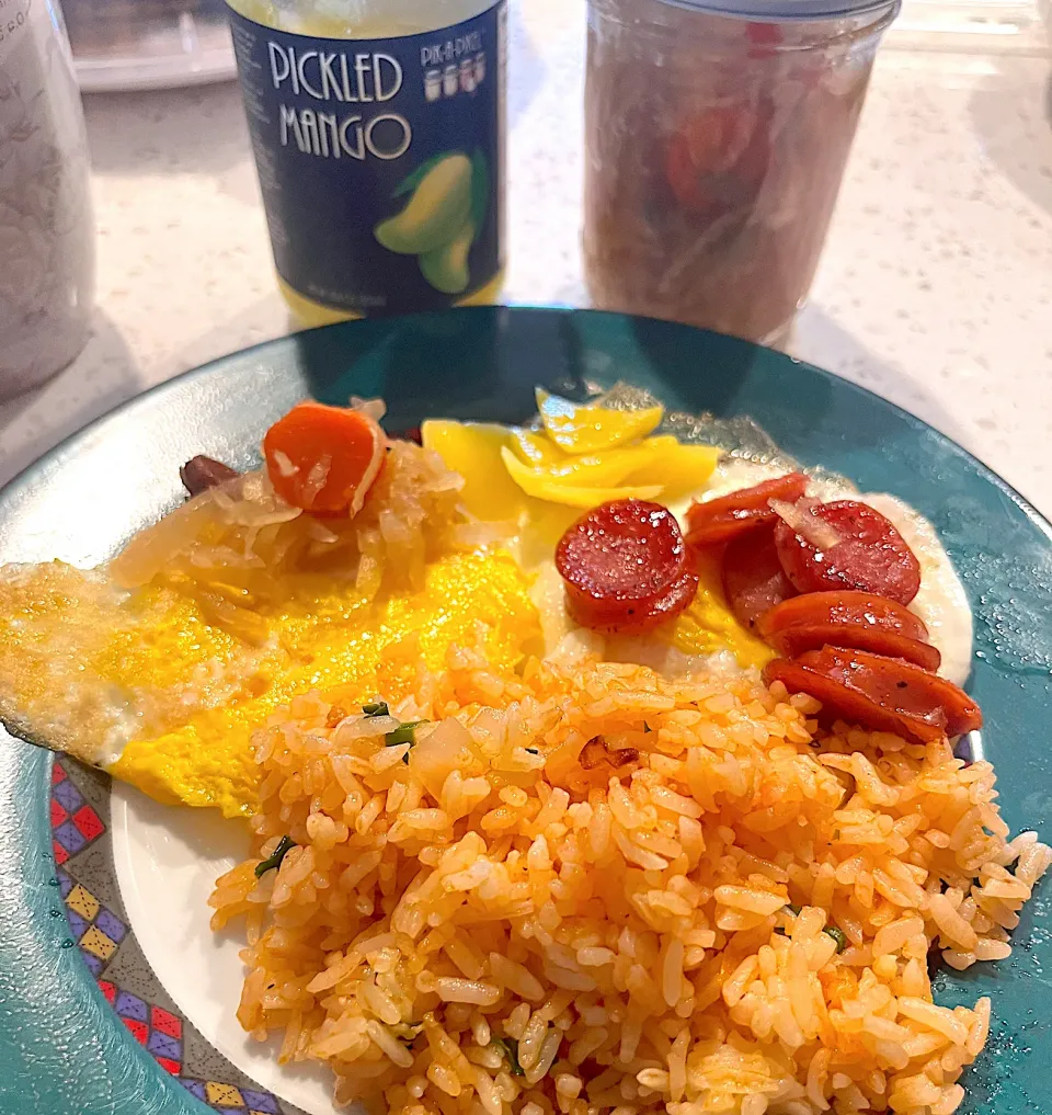 Snapdishの料理写真:Java rice , eggs, hamonado sausage, pickled mango, and atchara|🌺IAnneさん