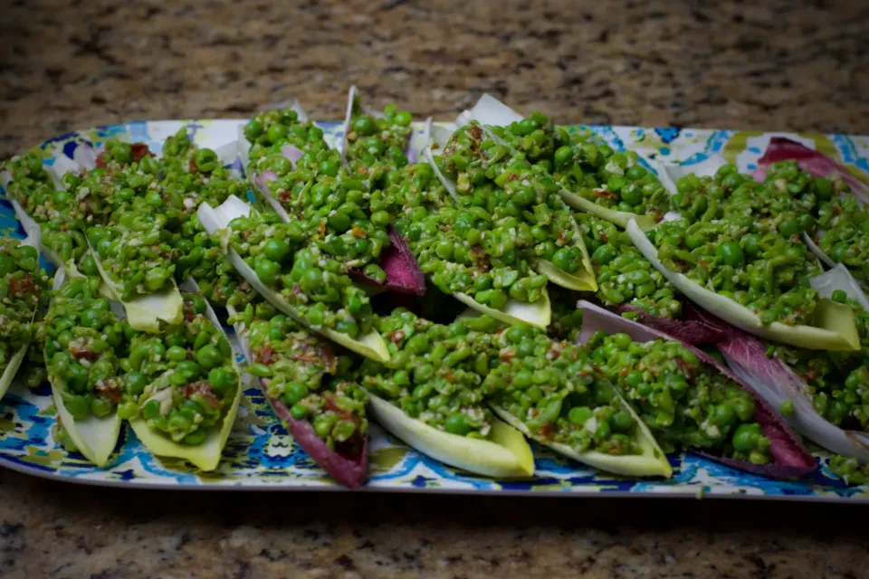 Snapdishの料理写真:Endive Leaves topped with Sun-dried tomatoes and parmesan|Laki Maikaʻiさん