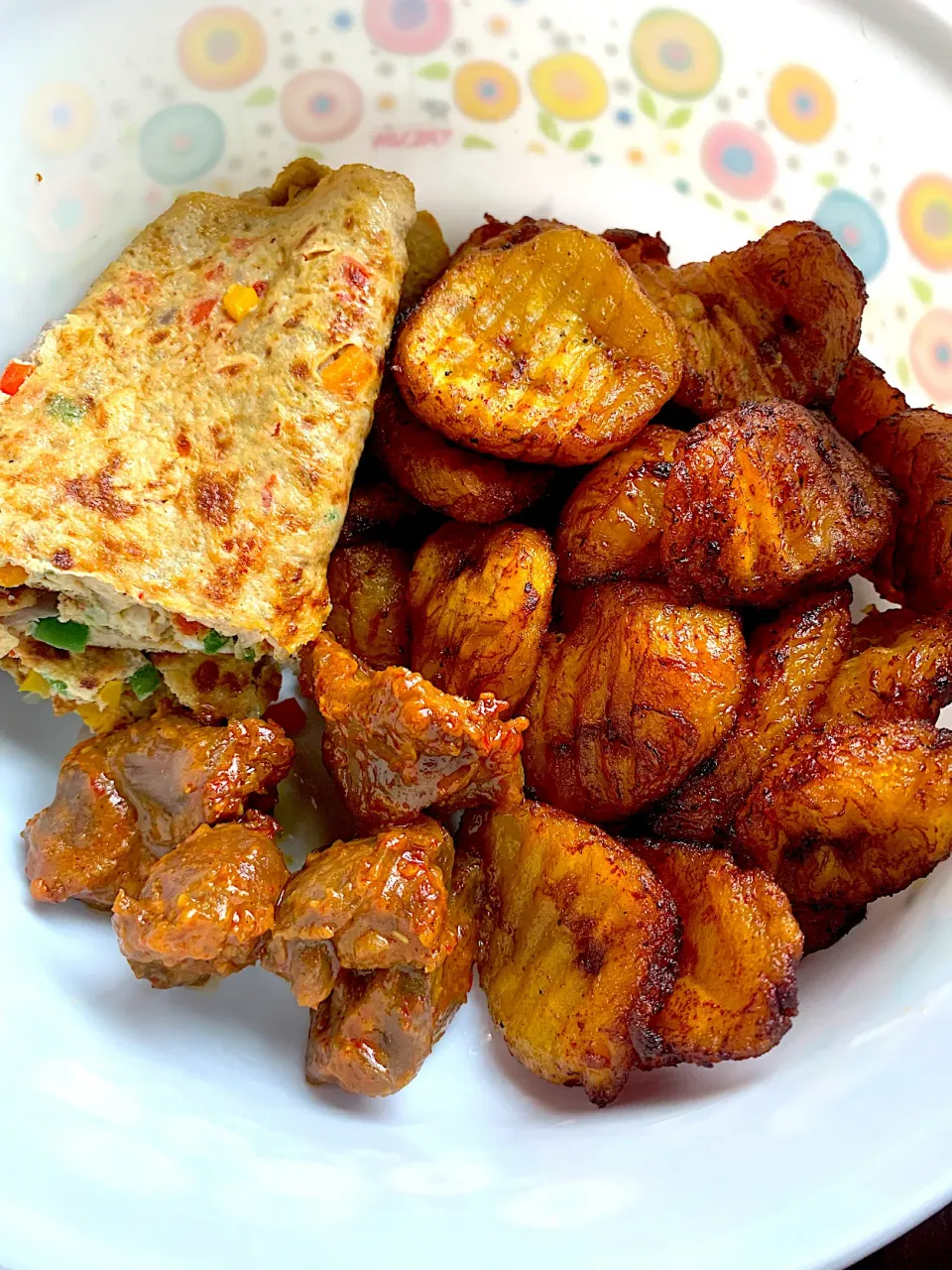 Snapdishの料理写真:Fried ripe plantain, gizzard and egg.The egg had shredded sausages in it.|Gloria Allisonさん