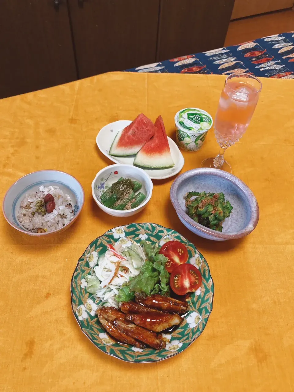 grandmaの晩ごはん☆ 今夜は昨日のお素麺でサラダ、鶏手羽の照り焼き．ゴーヤのポン酢和え…オクラのめかぶ和え。
差し入れのスイカ🍉をデザートに頂きます|kaoriさん