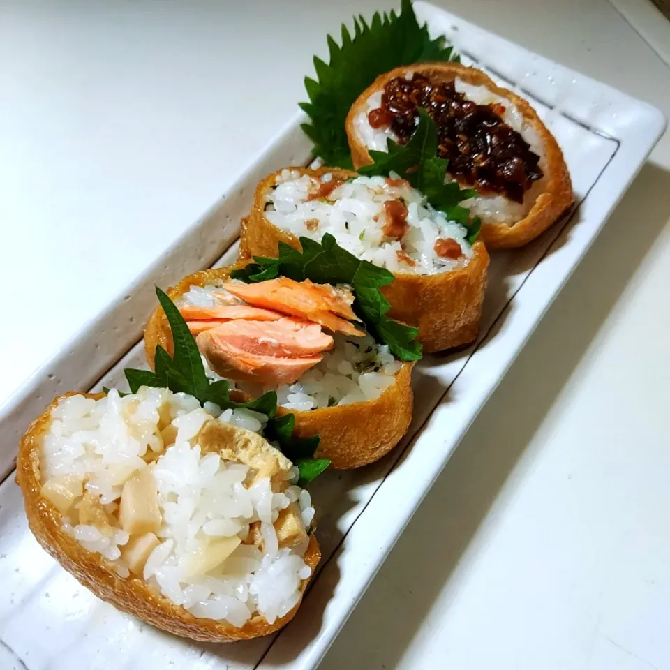 Snapdishの料理写真:いなり寿司(オリーブ牛旨飯だれ　菜飯梅肉　菜飯鮭　竹の子酢飯)|あかね空さん