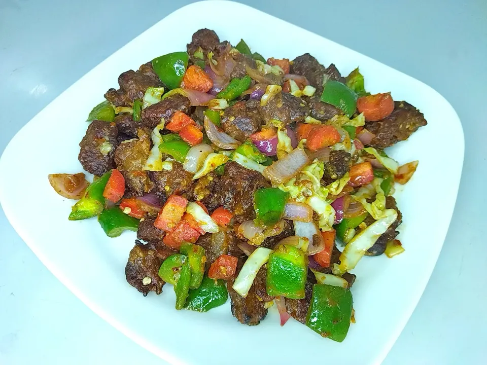 beef bites with vegetables sizzling|Fareehaさん